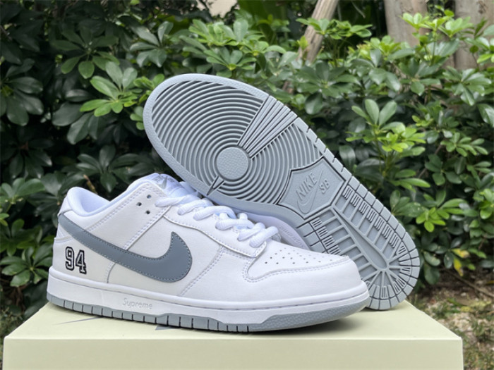S*prem* x Nike SB Dunk Low White / Metallic Silver-White HQ8487-100