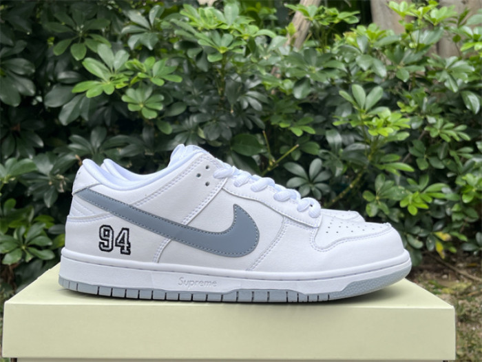 S*prem* x Nike SB Dunk Low White / Metallic Silver-White HQ8487-100
