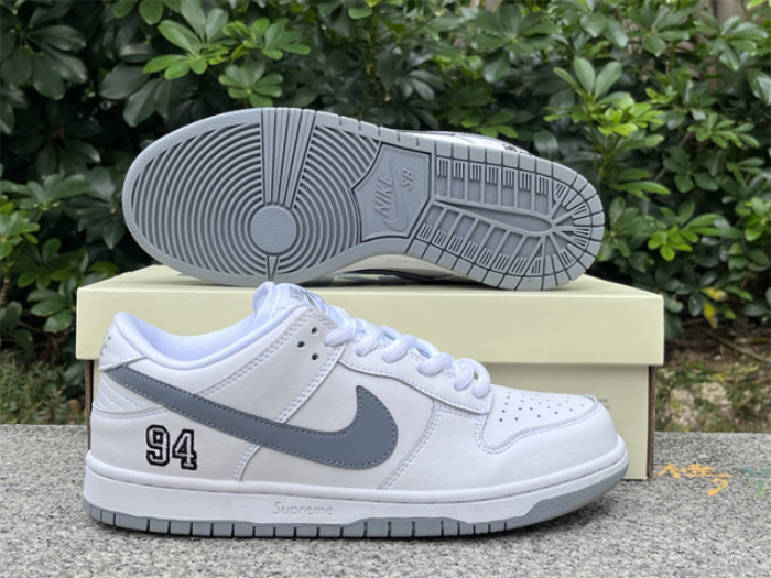 S*prem* x Nike SB Dunk Low White / Metallic Silver-White HQ8487-100